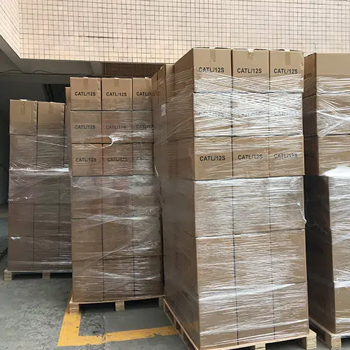 Palletized enclosure cartons wrapped and secured for shipment