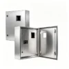 Open stainless steel outdoor electrical enclosure showing the internal mounting panel and door frame